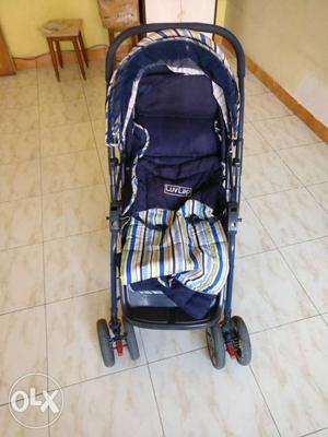 Baby's Blue And White Umbrella Stroller