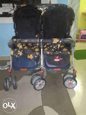 Black And Blue Floral Twin Stroller