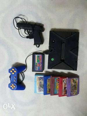Black Game Console,controller,and Games