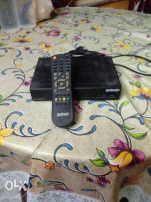Black TV Box With Remote