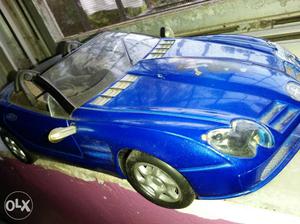 Blue toy car..let ur child enjoy the day...at nigotiable