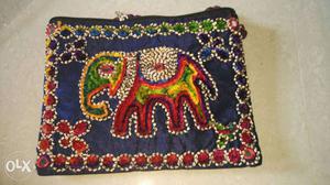 Elephant designer sling bag