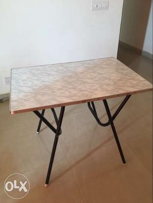 Gently used foldable table for sale
