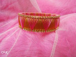 Gold & pink silk thread bangle