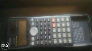 Gray And Black Casio Scientific Calculator