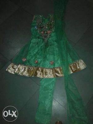 Green And Gold-colored Traditional Dress