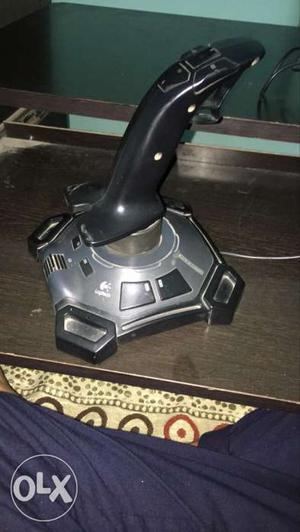 Grey And Black Logitech Gear Stick Controller