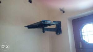 Metal wall TV stand at a good condition ready for