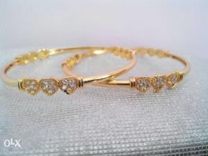 Pair Of Gold With Diamond Bangles