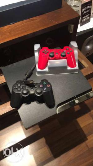 Play Station 3 along with 2(two) controllers