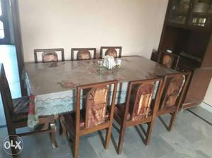 Rectangular Brown Wooden 9-piece Dining Set