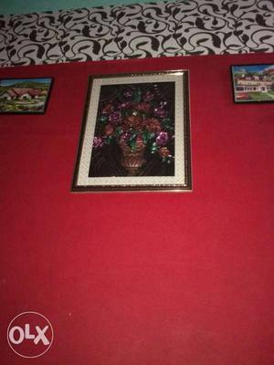 Red Wall And Brown Wooden Floral Photo