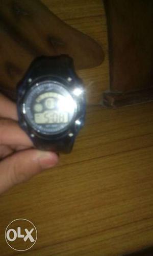 Round Faced Digital Watch With Black Strap