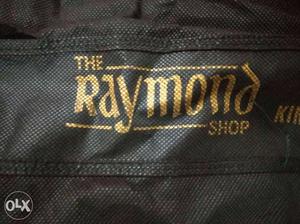 The Raymond Shop Clothes Tag