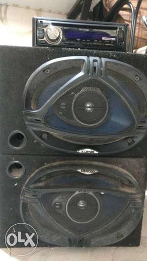 Two Black PA Speakers And Black 1 Din Car Stereo Head Unit