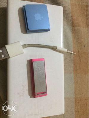 Two IPod Shuffle And USB Cable To Male Audio Jack