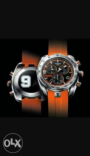 Two Orange And Silver Watches