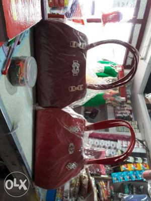 Two Red And Maroon Leather Handbag