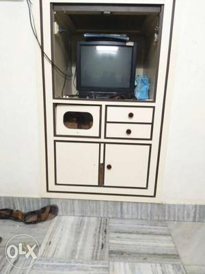 White Wooden Cabinet; Black CRT TV