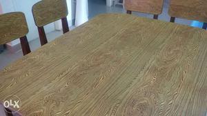 4-Seater wooden dining table in good condition