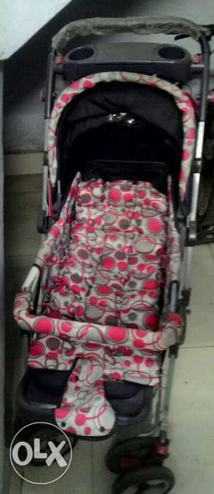 Baby's Gray And Red Umbrella Stroller