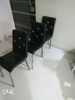 Black cushion seats set of 3 chairs 2 years old