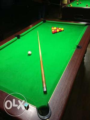 Brown And Green Billiards Table