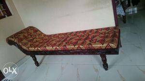 Brown Wooden Framed Red And Beige Padded Chaise Lounge