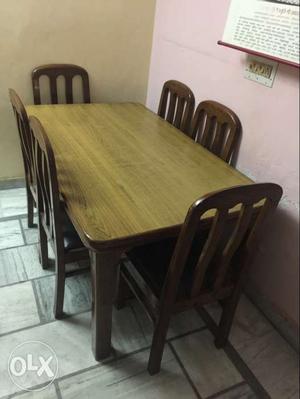 Brown Wooden Table And Chairs