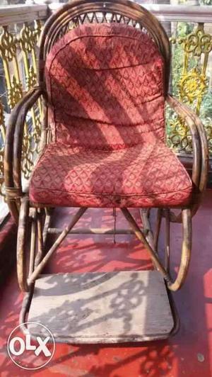 Cane rocking chair with cosy back rest and seat