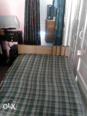 Double bed with mattress and without storage