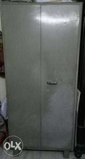 Metal cupboard with locker