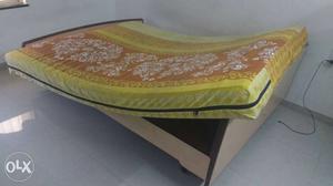 Queen size cot(teak) and Yellow And Brown Floral Mattress