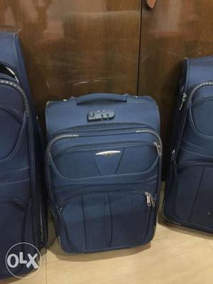 Three Blue polo Luggage Bags