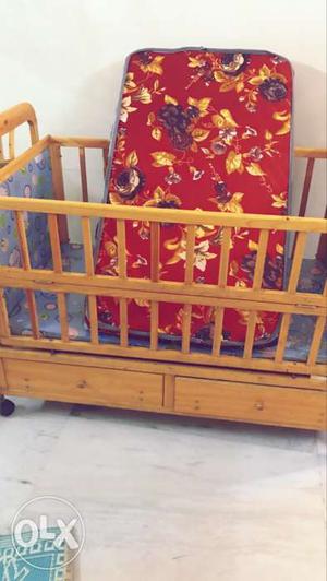 Wooden baby cot along with mattress age0-7yrs kid
