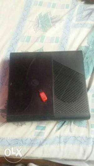 Xbox 360 with still warranty and 3 games