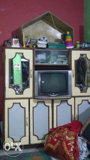 Almari with tv at lowest price. Price slightly