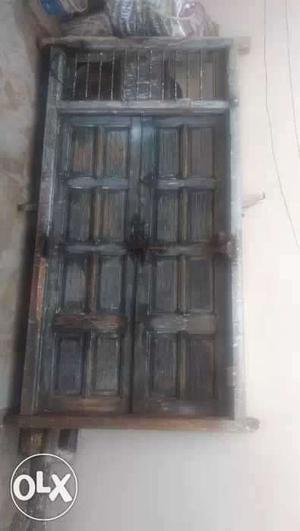 Antique heavy old door with heavy chokhat