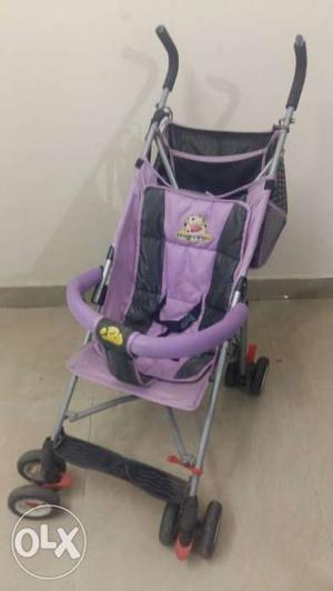 Baby's Black And Purple Stroller