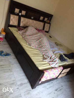 Black Wooden Bed Frame; Yellow Bed Mattress