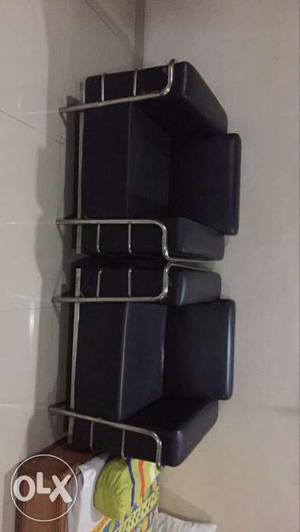 Black colour single seater two sofa