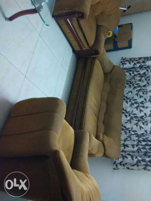 Fabric sofa. 3 + 1+ 1 seater. brown color fabric. wood frame