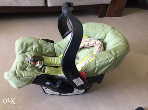 Greco brand baby car seat and carry cot