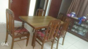 High quality wood dining table with 6 chairs.