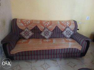 Orange And brown Sofa with cotton rich finish.5 seater