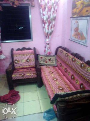 Two Brown Wooden Frame Pink Floral Padded Sofa Set