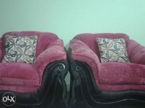 Two Pink-black-gray Suede Sofa Chairs With Throw Pillows