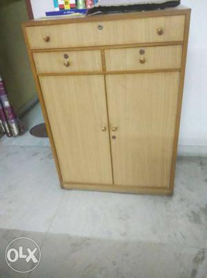 Wooden cupboard for books or as a shoe case or