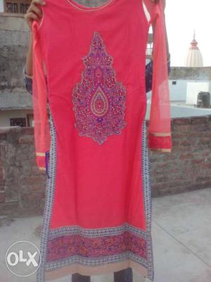 A heavy embroidery gajri colour suit with churi