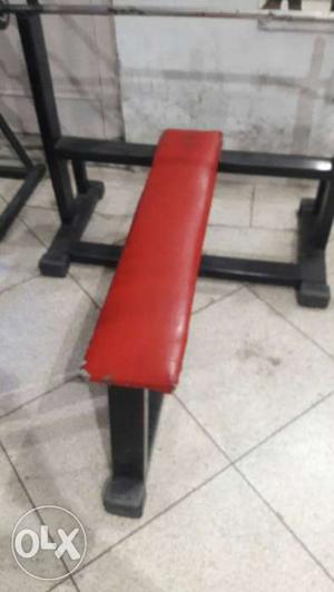 Black And Red Metal Frame Bench Press